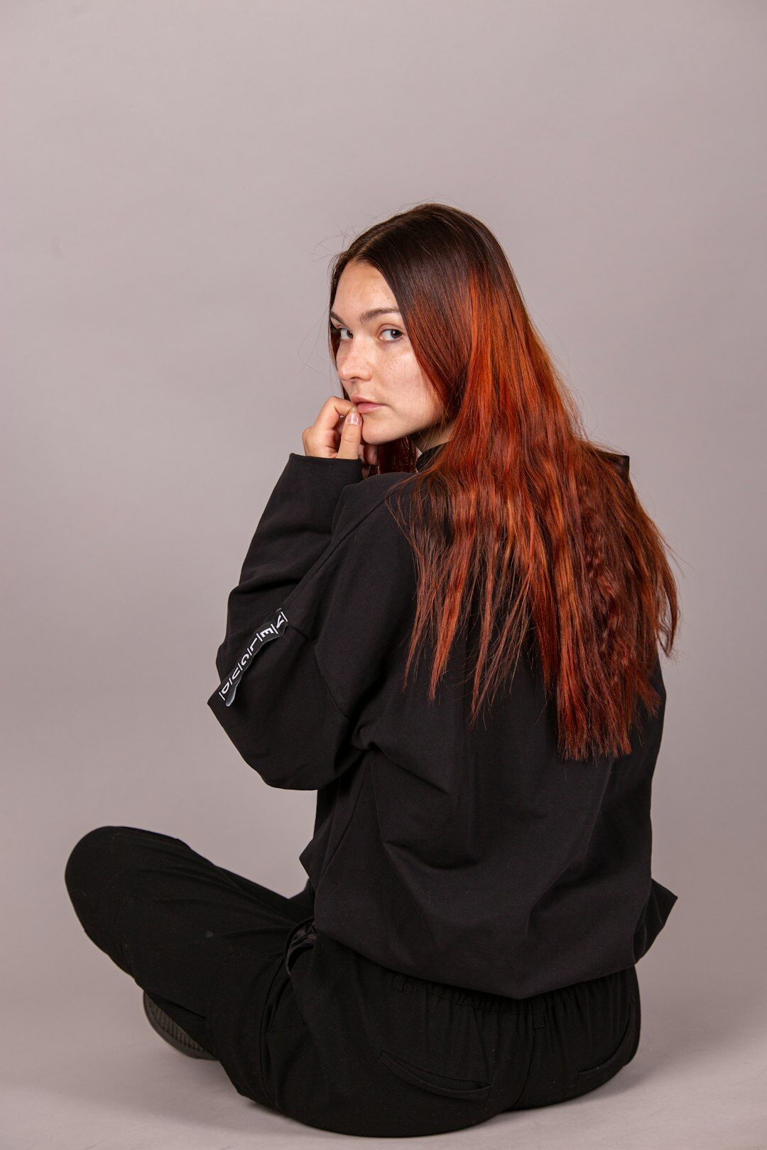 Studio portrait of a smiling young Slovak woman coordinator